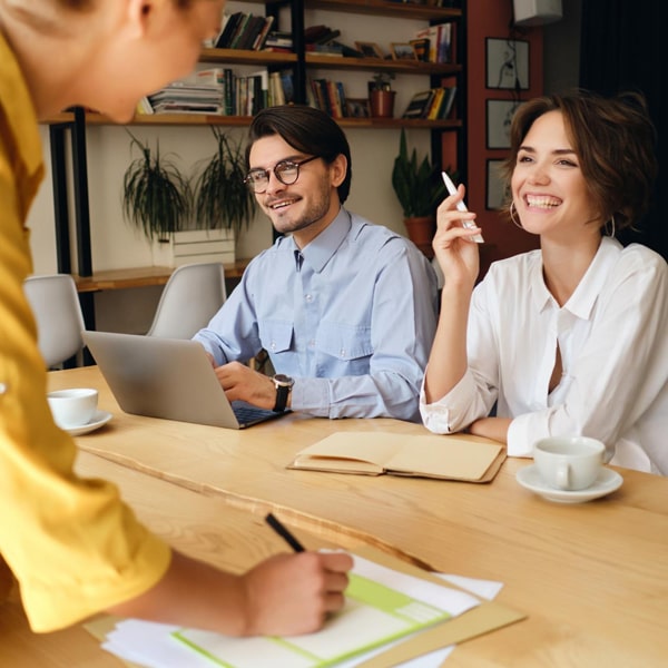 Professional corporate team collaborating during a brainstorming and strategy meeting in a modern office